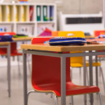Empty classroom with bright colors and zoom in on desks