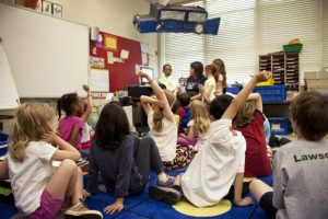 Raised-Hands-K12-696x463